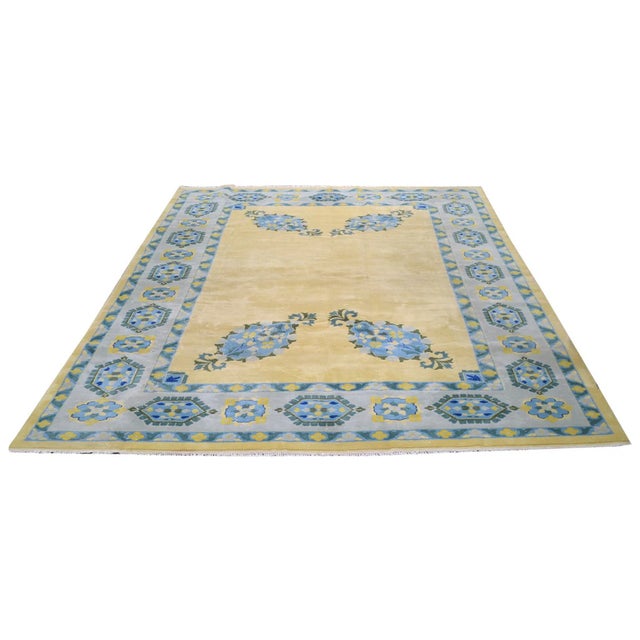 Hand-knotted with care using traditional rug-making techniques, this wool rug blends timeless craftsmanship with a modern...