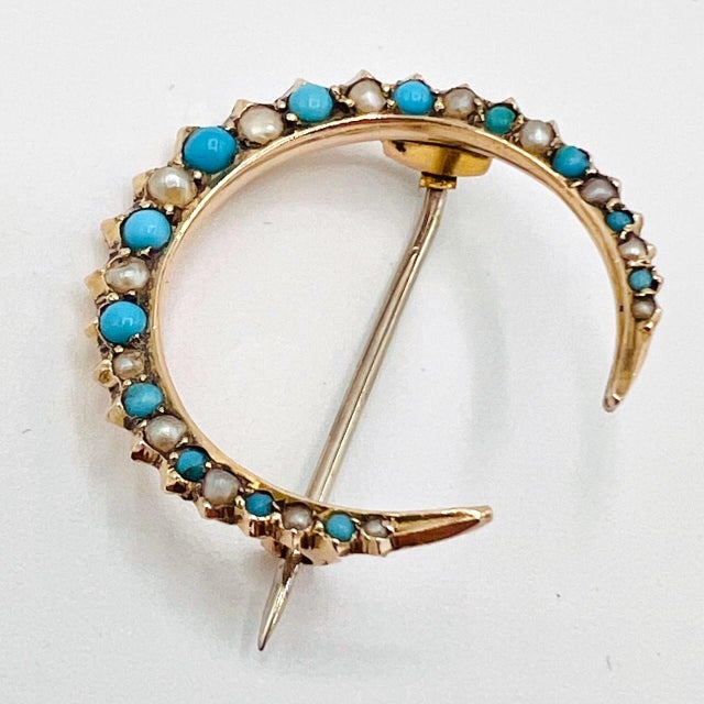 Antique Edwardian 9ct Gold Turquoise & Seed Pearl Crescent Brooch, c. 1900 A delicate antique Edwardian crescent brooch,...