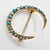Antique Edwardian 9ct Gold Turquoise & Seed Pearl Crescent Brooch, c. 1900 A delicate antique Edwardian crescent brooch,...