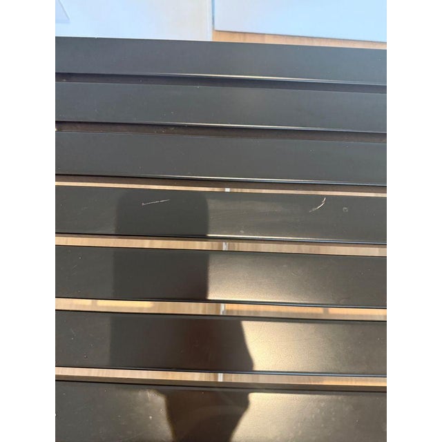 Bertoia Bench With solid wood slats and a welded steel base, this sleek bench is every bit as iconic as the rest of Harry...