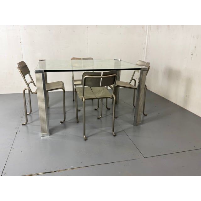 Rectangular Peter Ghyczy heavy chrome metal legs and thick Glass top Dining table or Desk. This piece has an attribution...