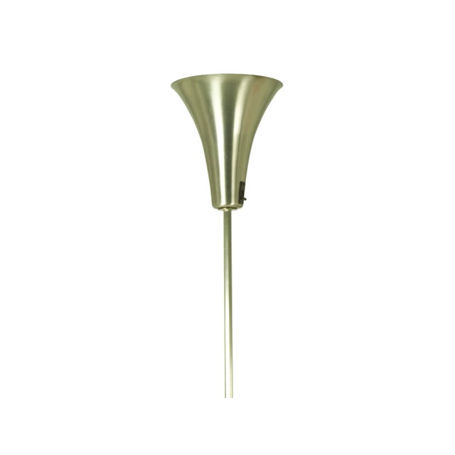 This Luminator/floor lamp was designed and produced in Italy around the 1940s. It is made from nickeled brass and...
