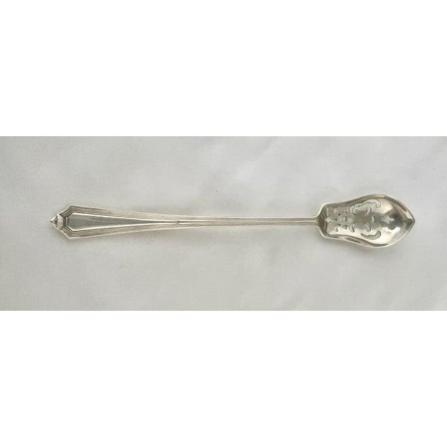 Lovely early 20th century English sterling silver serving spoon, possibly a berry spoon. Hallmarked with an anchor that...