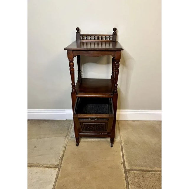 Antique Victorian quality carved mahogany coal box having a quality mahogany top with a gallery back supported by turned...