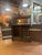Vintage Dry Bar Cabinet with Mirrored back. Bar has 2 doors that provide lots of storage with wine bottle holders and...