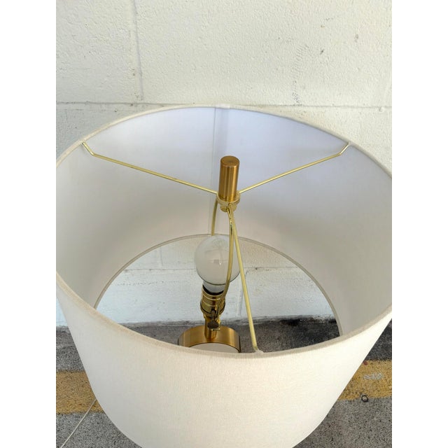 Stylish Uttermost Three Rings Table Lamp. Alabsater discs with brass details and white drum lamp shade. Original Retail...