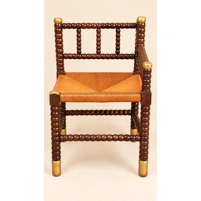 A corner chair, also known as a fireside chair, in the louis xiii style, dating from the 19th century. The entire...
