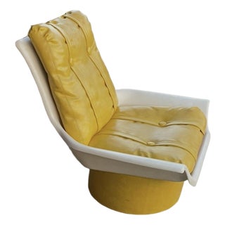 Circa 1970s Morris Futorian, Attributed, Space Age Molded Plastic Swivel Lounge Chair in Lemon-Yellow Tufted Naugahyde For Sale