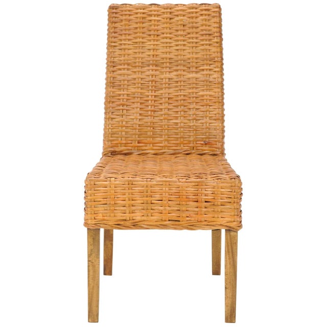 The transitional rattan Side Chair brings a soft touch to contemporary interiors in need of warmth. Crafted with mango...