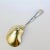 A very fine Tiffany & Co. sterling silver serving or berry spoon. With a gold wash to the bowl. In the 'Vine' pattern with...