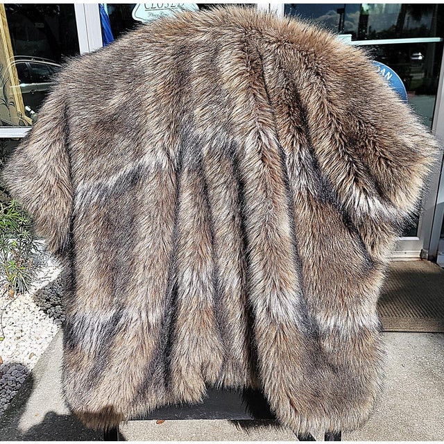 Amazingly realistic faux fur throw from Restoration Hardware, the Kodiak bear version, likely much softer than the bear....