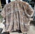 Amazingly realistic faux fur throw from Restoration Hardware, the Kodiak bear version, likely much softer than the bear....