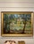 This is a lovely French oil on canvas depicting a lush, impressionist-style riverside landscape featuring trees flanking a...