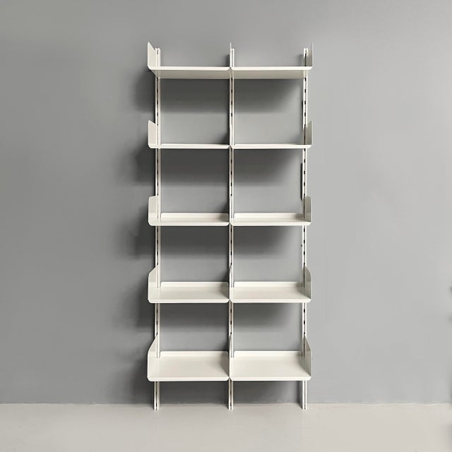 Italian modern white metal bookcase by Kriptoninte, 1980s Wall-mounted bookcase with two bays made entirely of white...
