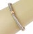 This is an elegant authentic flex bangle from Roberto Coin, it is crafted from 18k white and rose gold featuring a fine...