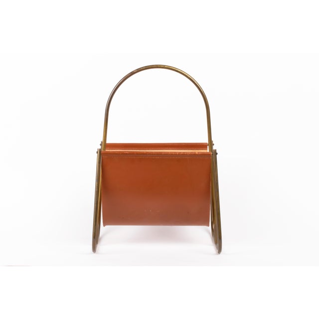 Carl Auböck magazine rack from Austria from the 1960s. This piece is attributed to the mentioned designer/maker. It has no...