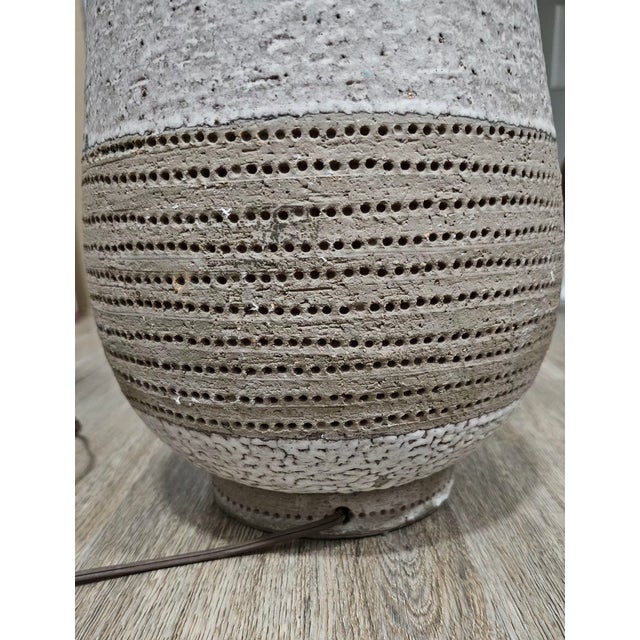 This lamp has been in my family home since late 1960's. It will be very hard to part with, and unfortunately the shade is...