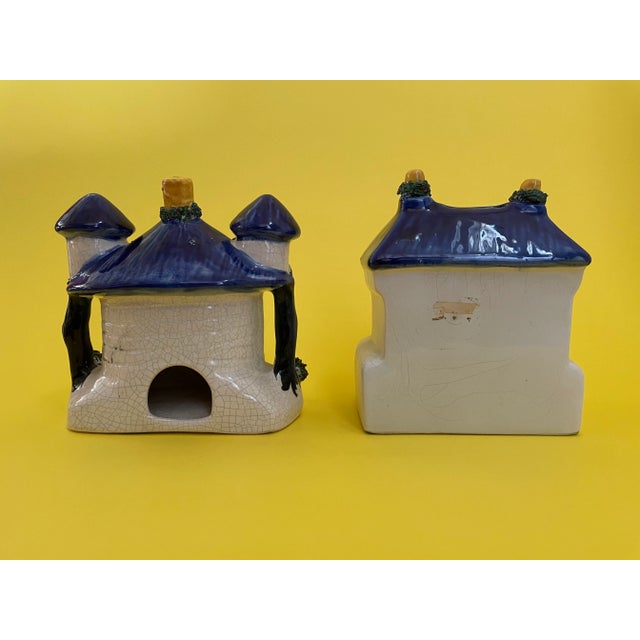 Great vintage Staffordshire cottage duo. Vibrantly colored and in great condition. The rounded front cottage (with two...