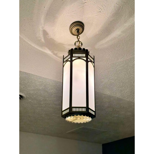 This listing is for one (1) mid century Gothic Pendant light. It is bronze or bronze color decorative metal with...