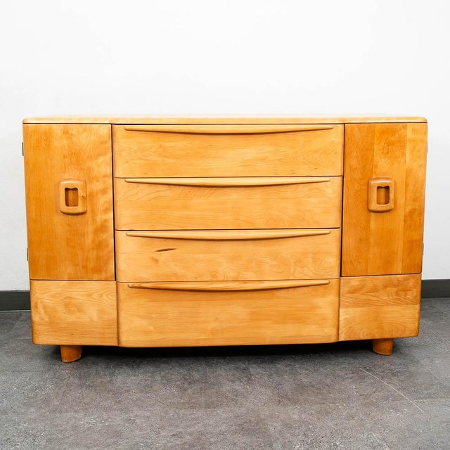 Heywood Wakefield 4 drawer buffet credenza. Very sturdy and functional. Looks wonderful in its original champagne finish....