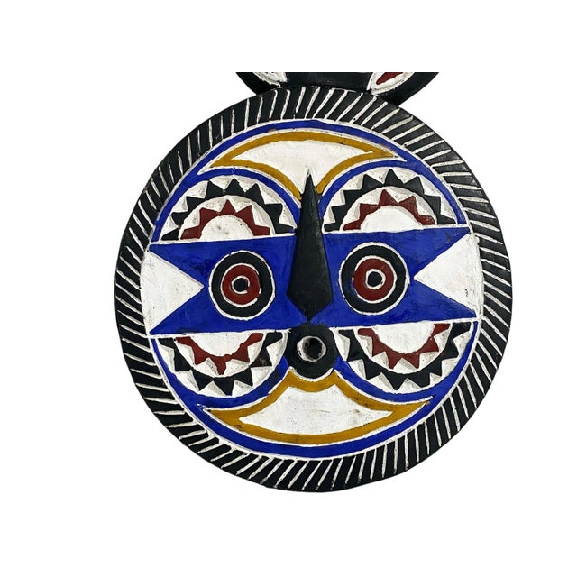 A beautiful and unique handcrafted Goli tribe mask that originates from the Akan people from Ghana and the Ivory Coast who...