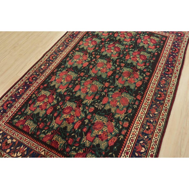 This authentic vintage traditional Afshar rug is hand-knotted with an all-wool pile on a cotton foundation. This rug...