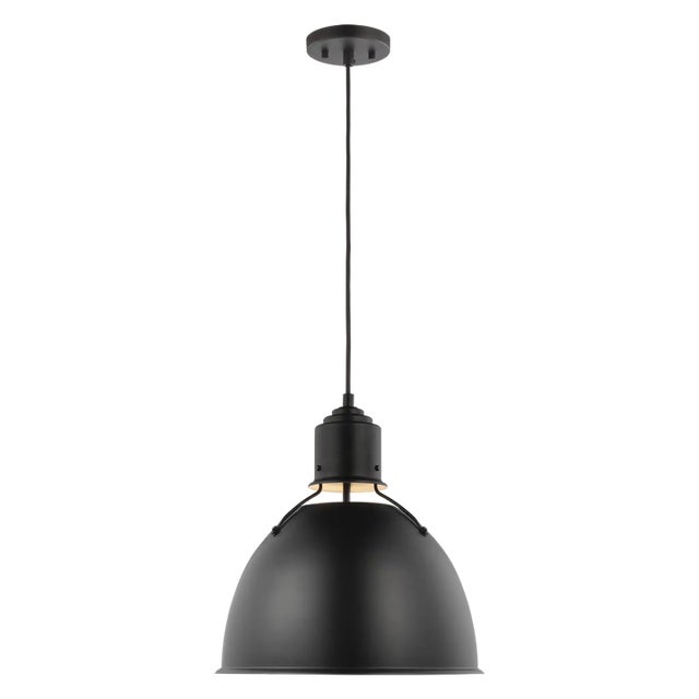 The Huey one-light pendant is offered in the Brushed Nickel, Antique White, Midnight Black, or Satin Bronze finish. The...