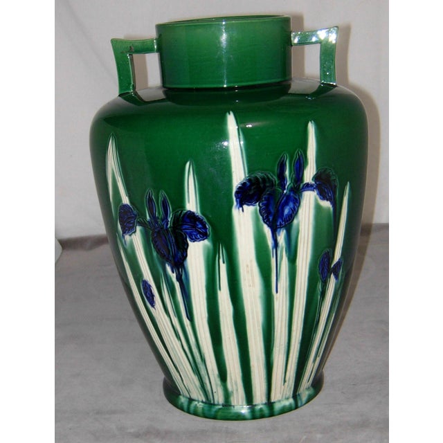 Offered here is a beautiful circa 1830s-1930s Japanese Awaji Pottery Vase with Angular Handles and Iris Design in...