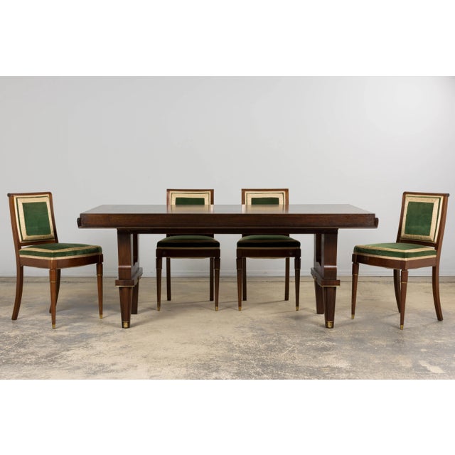 A distinguished late 1930s Parisian Art Deco dining table, in the taste of Jules Leleu, sourced in Paris. The rectangular...