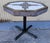 This fine inlaid pedestal table has custom inlaid tiles with the New Mexico sign on top.The base is in a blue pieced wood...