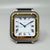 This stunning 1980s cartier santos pendulette alarm clock represents a sophisticated blend of functional design and...