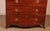 Exquisite bombé mahogany commode from the Regency period, circa 1800. This commode is of exceptional quality, featuring...