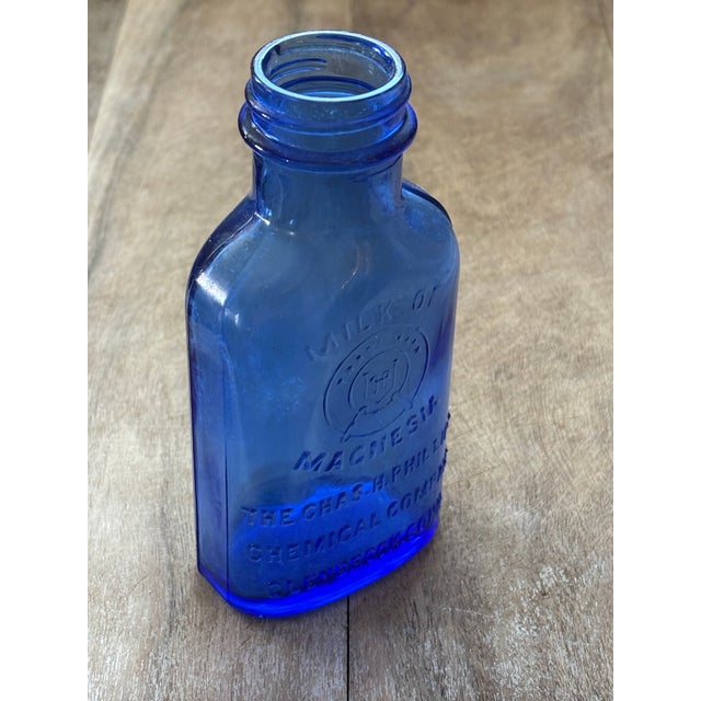 American Early 1900’s Blue Glass Milk of Magnesia Bottle For Sale - Image 3 of 7