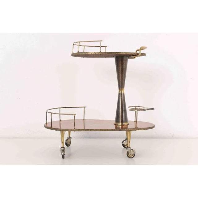 Bar cart Designer: unknown italian designer Year: around 1955 Manufacturer: unknown Country: Italy Measurements: H 70 cm,...