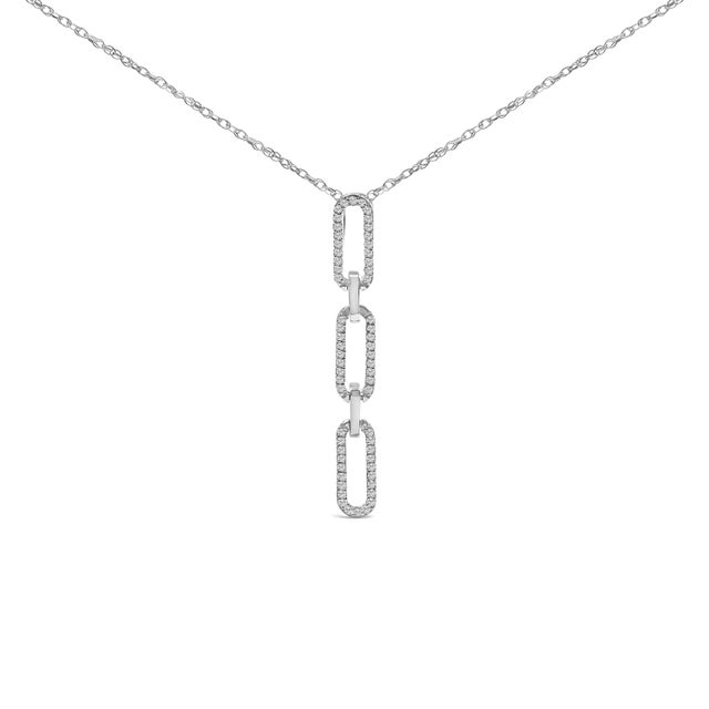 This exquisite piece artfully fuses elegance with whimsy, presenting a 14K white gold pendant that mimics the familiar...