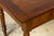 A French Louis Philippe period walnut writing table dating to the mid-19th century, sourced in Provence, France. The table...