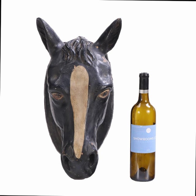 Expressively modeled with strong anatomical detail, the piece features a soft, timeworn painted finish with a distinctive...