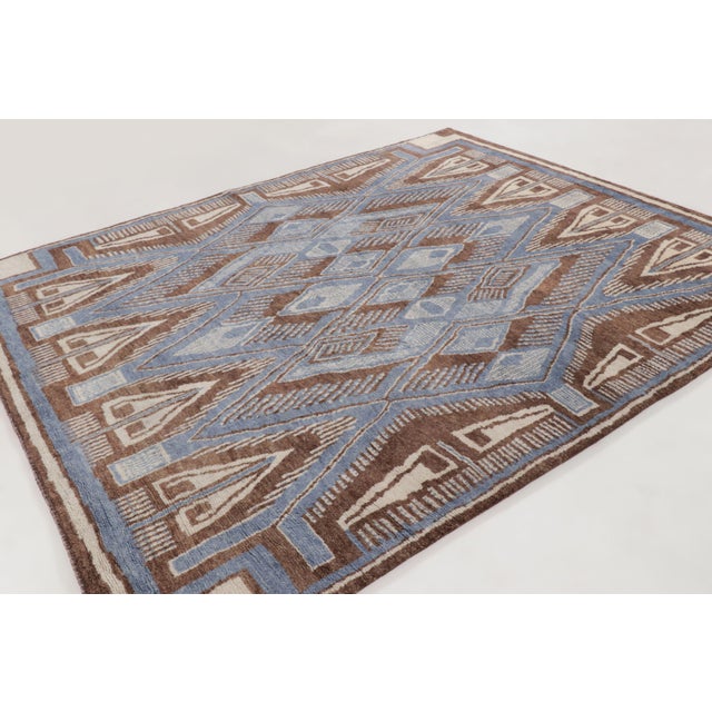 Hand-knotted in wool, this 8x10 contemporary rug joins Rug & Kilim’s Art Deco collection. It features a central diamond...