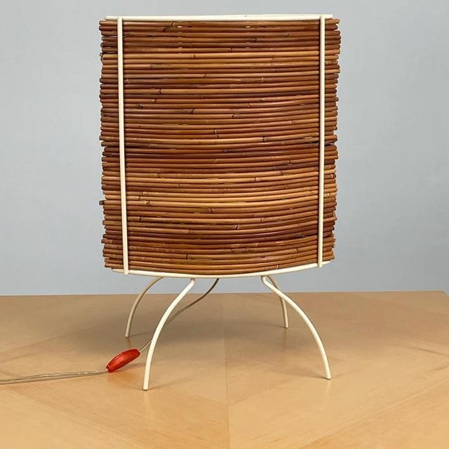 The limited edition Bambú table lamp designed by Fernando and Humberto Campana for Fontana Arté Candle is handcrafted from...