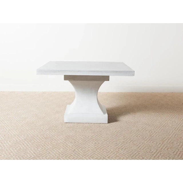 Cast stone dining table Modern pedestal base French grey finish For indoor or outdoor use Includes removable pedestal base...