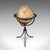 This is a late vintage tripod globe. An American, steel framed globe with topographical gores, dating to the early 21st...