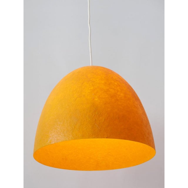 Extremely rare and elegant mid-century modern pendant lamp or hanging light. Designed & manufactured in germany, 1970s....