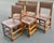 Set of 6 early 1900’s English Cromwellian dining chairs. Crafted in oak with original brown leather and brass tack design....