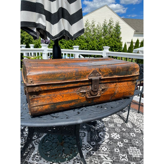 Vintage industrial metal trunk/suitcase crafted from solid metal & retains its original hardware & metal details. The...