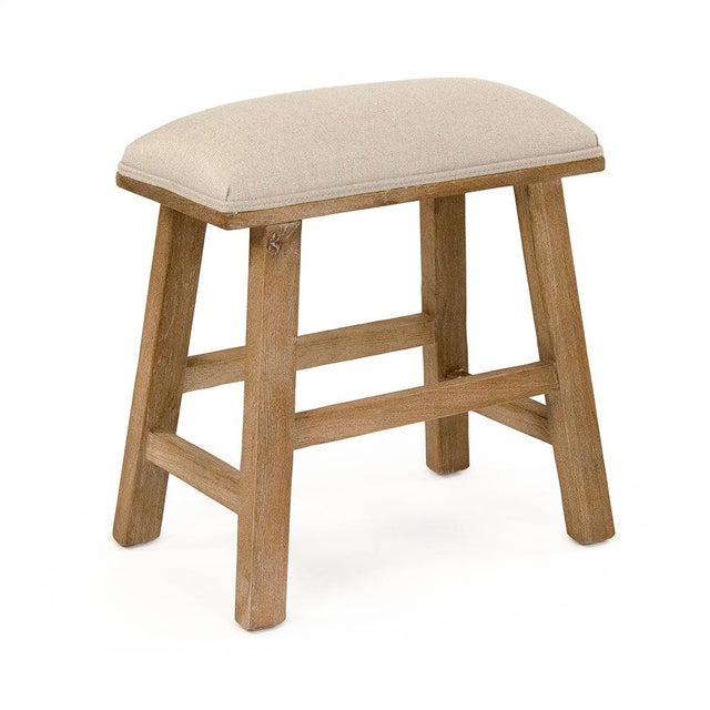 The Jocelyn Stool from Zentique is a compact, farmhouse-inspired seat with a padded natural linen cushion atop slightly...