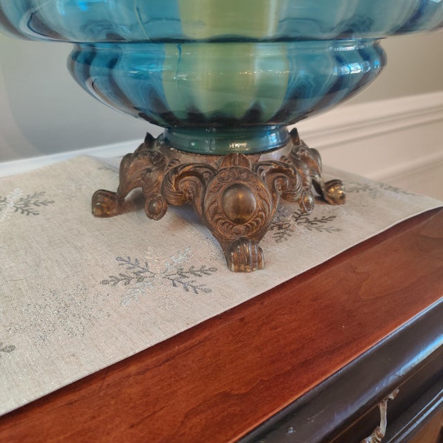 Need some jewelry for your room? These very large two vintage lamps have a beautiful blue glass base with brass footing...
