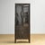 This cabinet is made of iron and glass, creating a rugged industrial look. The cabinet has been stripped down to the metal...