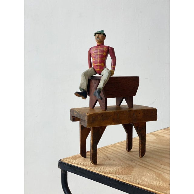 Antique Folk Art Painted Wood Soldier with Red Coat, Circa Early 20th Century. Carved wood representation of a soldier...