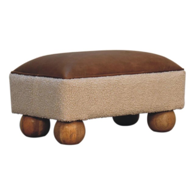 Add texture and charm with this Solid Wood Upholstered Accent Stool. The top is upholstered in rich buffalo hide leather,...