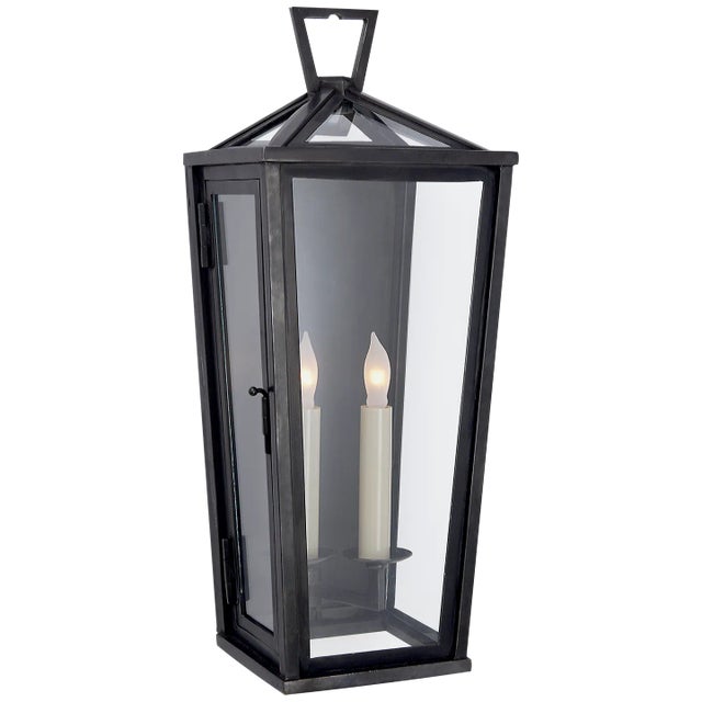 Darlana Small Tall 3/4 Wall Lantern in Bronze Designer: Chapman & Myers Height: 18.5" Extension: 6.75" Backplate: 6.75" x...